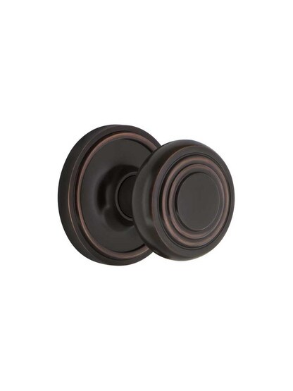 Classic Rosette Mortise Lock Set with Deco Style Knobs in Timeless Bronze.